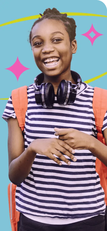 Smiling student with headphones and backpack